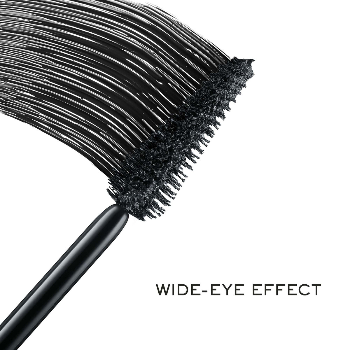 Lancôme mascara swatch on lashes showing glossy volume and fanned-out effect