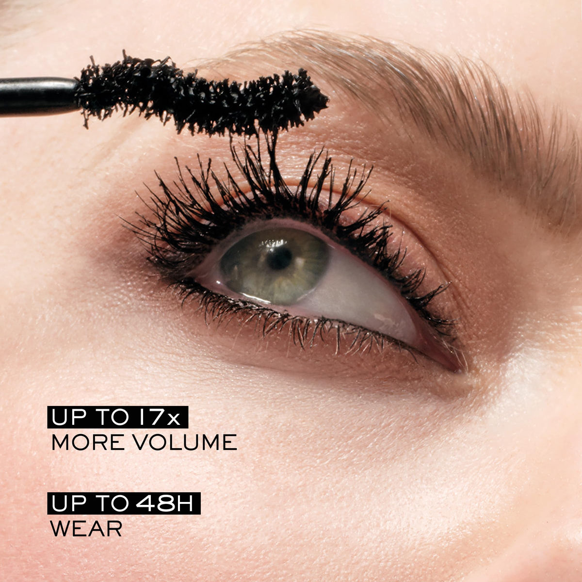 Lancôme Hypnôse Drama oversized S-shaped brush close-up demonstrating thorough lash coverage