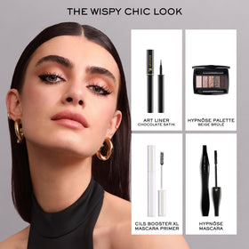 Lancôme tube beside coin for size comparison and travel-friendly convenience
