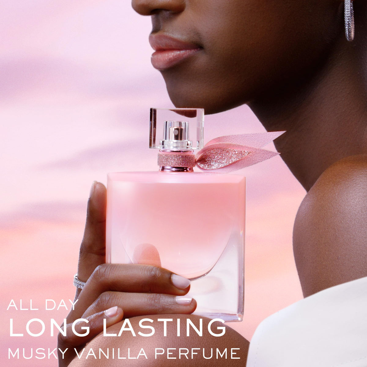 Lancôme cap and spray detail emphasizing precise application benefit
