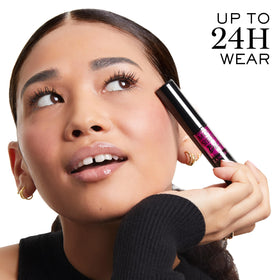 Lancôme Monsieur Big held in hand for scale showing easy application benefit