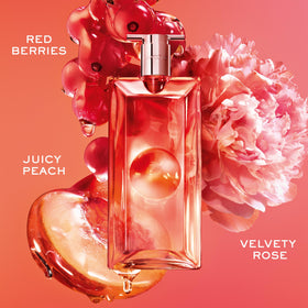 Lancôme perfume being spritzed on wrist demonstrating application for lasting wear