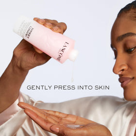 Lancôme next to common items to show 13.5 oz scale and lasting supply
