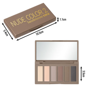 LANDMOON flat-lay with palette and brushes for travel-ready routine