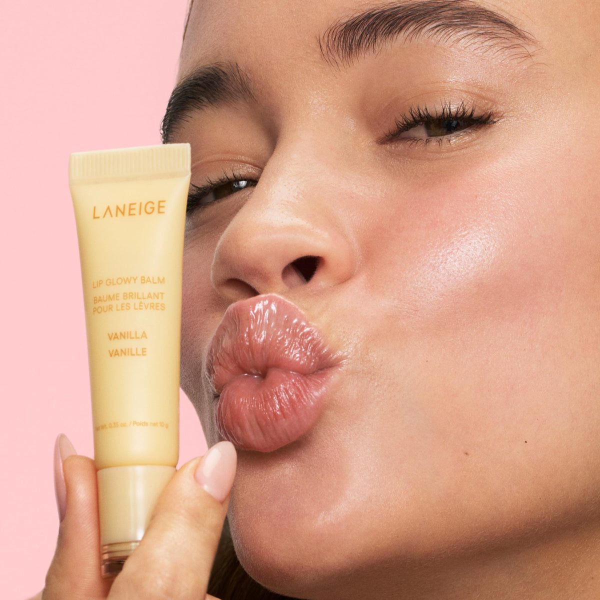 LANEIGE Lip Glowy Balm stick close-up showing smooth balm for instant shine