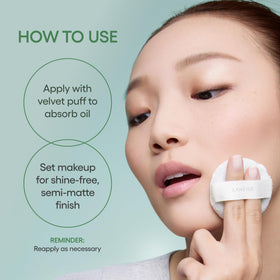 LANEIGE compact held in hand illustrating travel-friendly size and convenience
