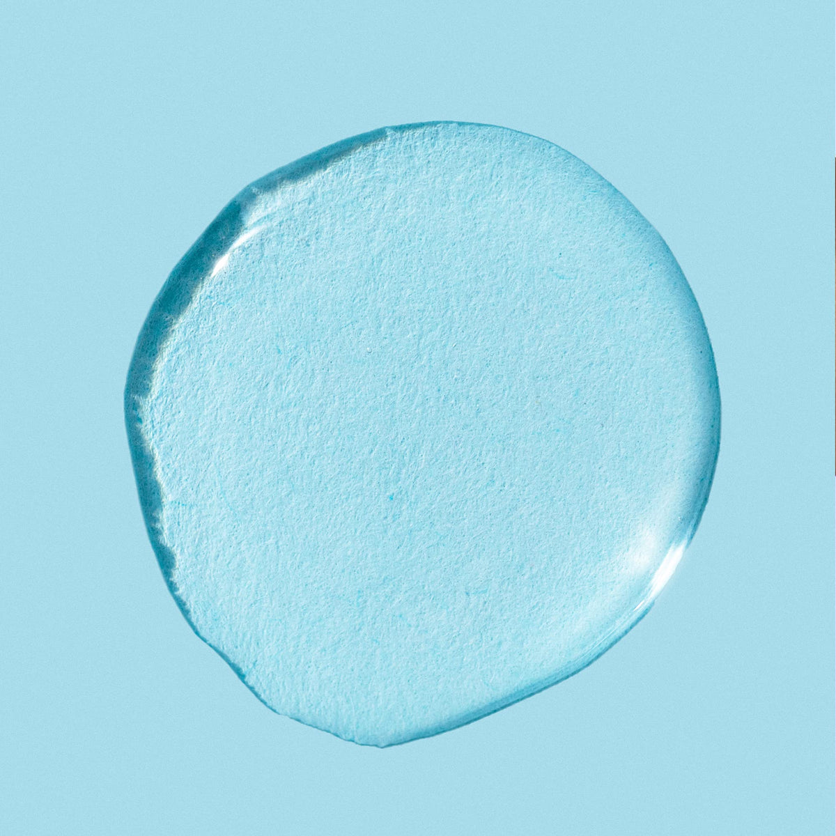 LANEIGE toner on cotton pad being applied to skin for gentle exfoliation and balance