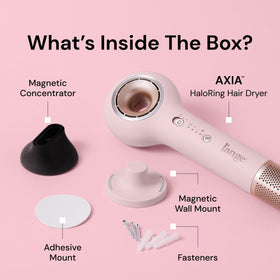 L'ANGE HAIR dryer held in hand to show scale and effortless handling benefit