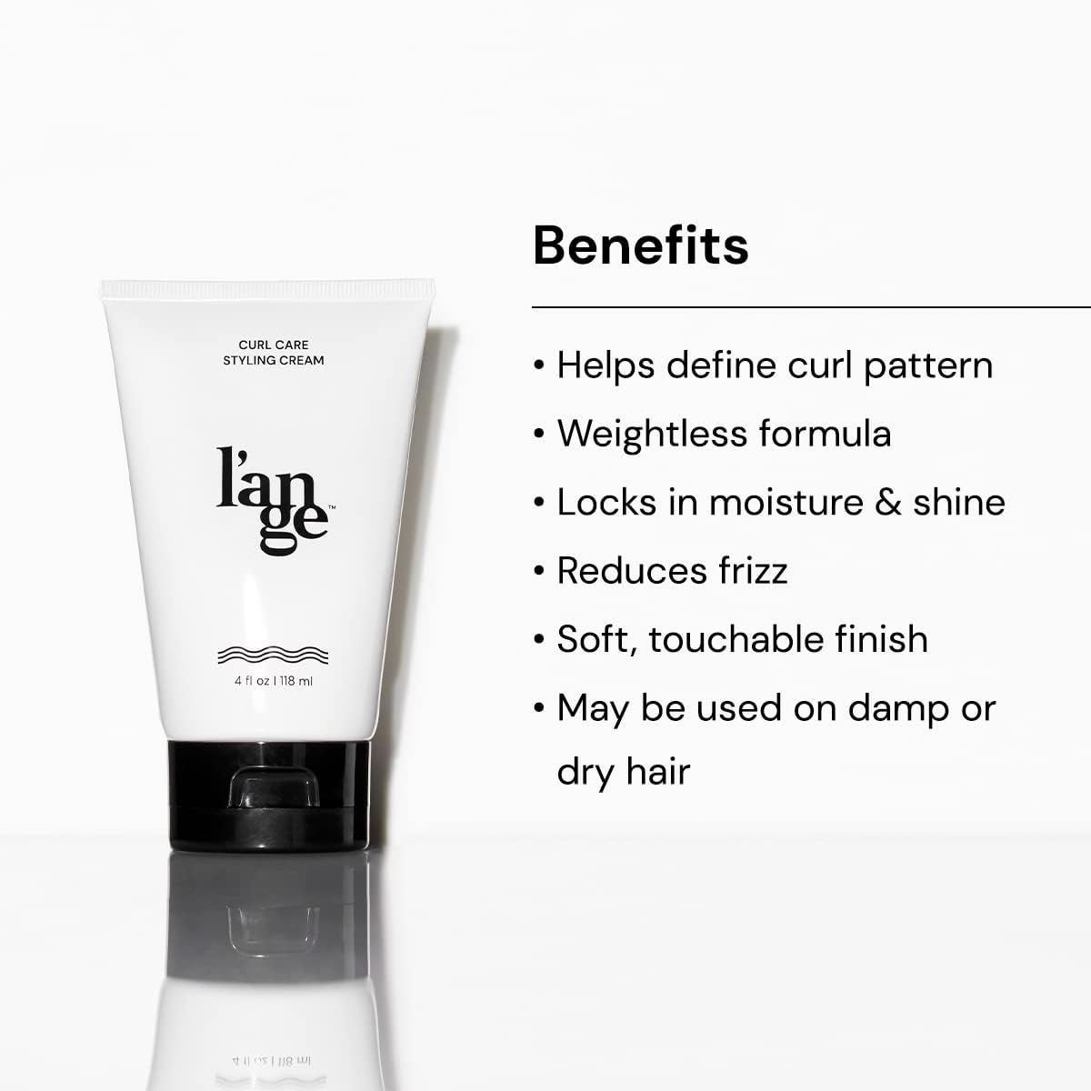 L'ANGE HAIR cream in hand being applied to curls for easy styling