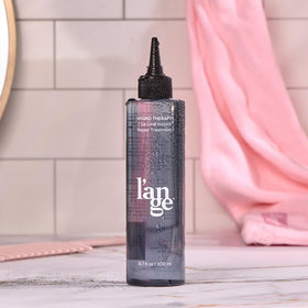 L'ANGE HAIR lifestyle bathroom shelf emphasizing everyday styling ease
