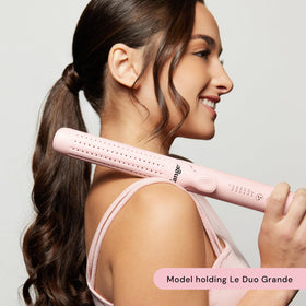 L'ANGE HAIR styling long hair into curls, showing faster section coverage benefit
