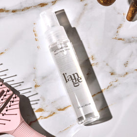 L'ANGE HAIR applied to styled hair showing frizz control and polished finish