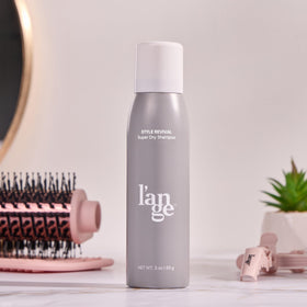 L'ANGE HAIR next to travel items showing compact 3 oz convenience