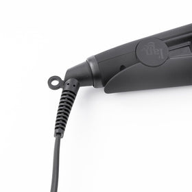 L'ANGE HAIR styling in use on long hair delivering one-pass smoothness