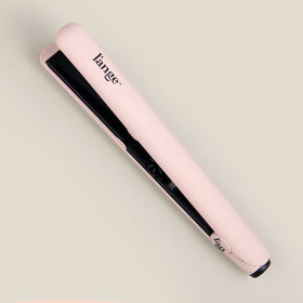 L'ANGE HAIR packaging with warranty card showing professional presentation and support benefit