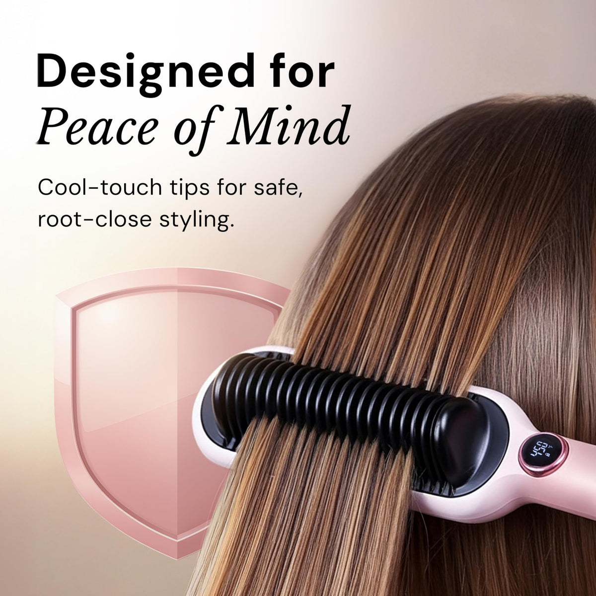 L'ANGE HAIR size comparison with hand to show compact travel-ready dimensions