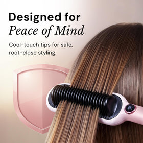 L'ANGE HAIR size comparison with hand to show compact travel-ready dimensions