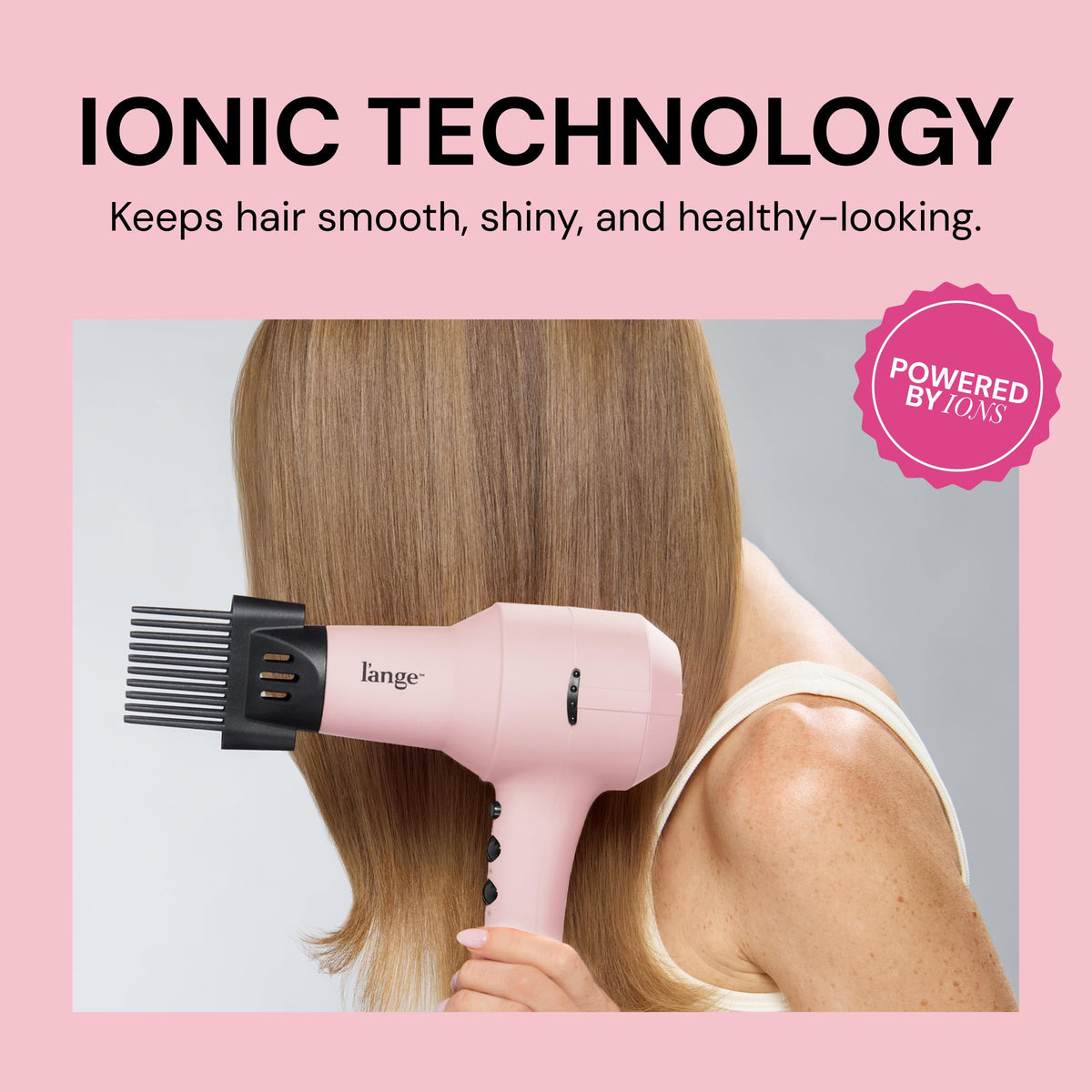 L'ANGE HAIR dryer in hand showing compact size and travel-friendly portability