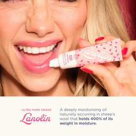 Lanolips open tin with finger applying ointment for easy targeted use