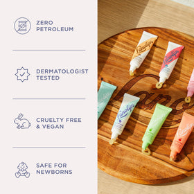 Lanolips tin in a handbag demonstrating portability and on-the-go care