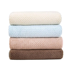 Laojbaba towel on bathroom counter suggesting practical everyday use