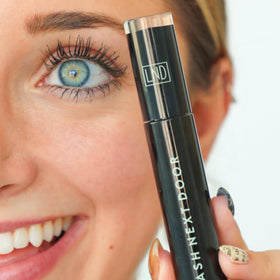 LASH NEXT DOOR mascara applied on lashes for visible length and volume