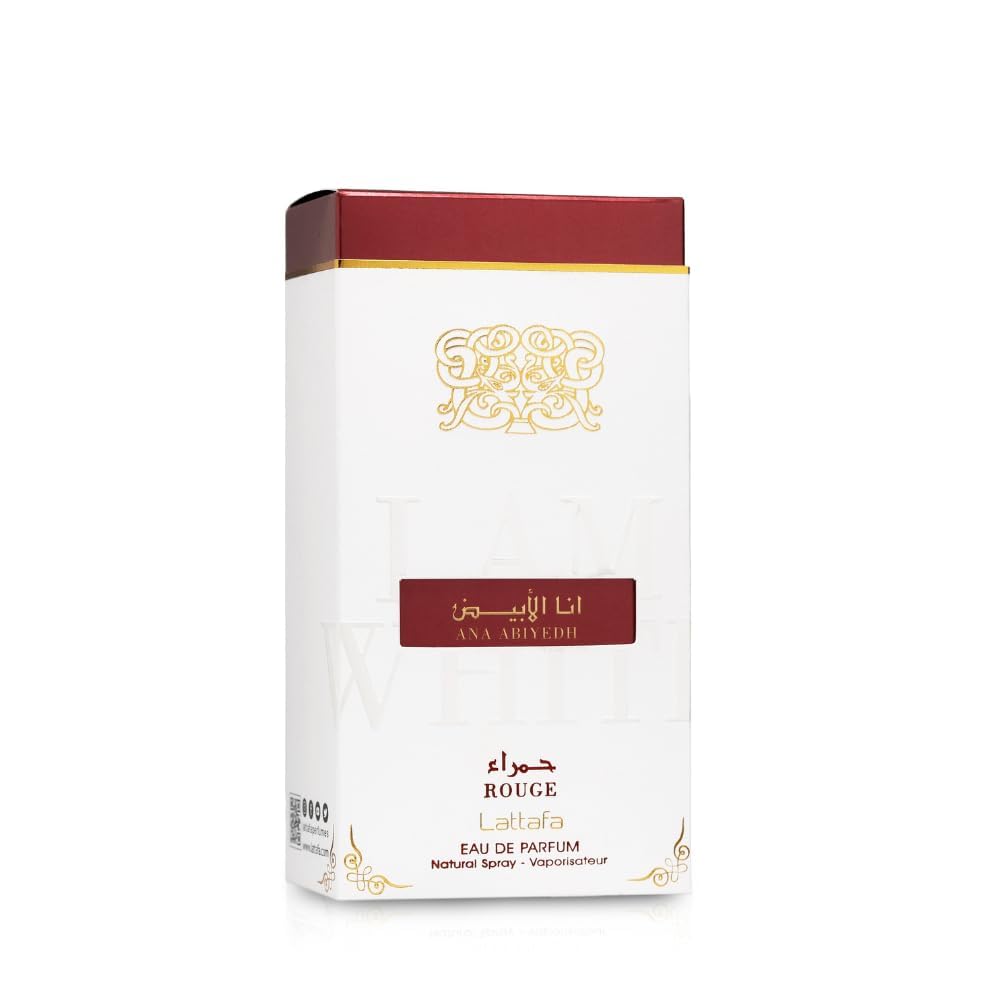 Lattafa Ana Abiyedh Rouge bottle on dresser with ambient light, lifestyle mood and daily-wear benefit