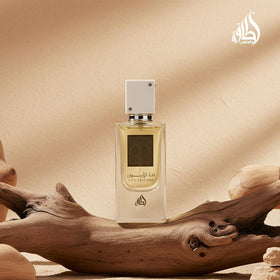 Lattafa bottle staged on wood to convey oriental woody base atmosphere
