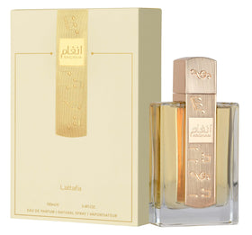 Lattafa Angham angled bottle capturing glass reflections and premium presentation benefit