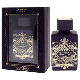 Lattafa perfume spray in hand illustrating easy application and good projection