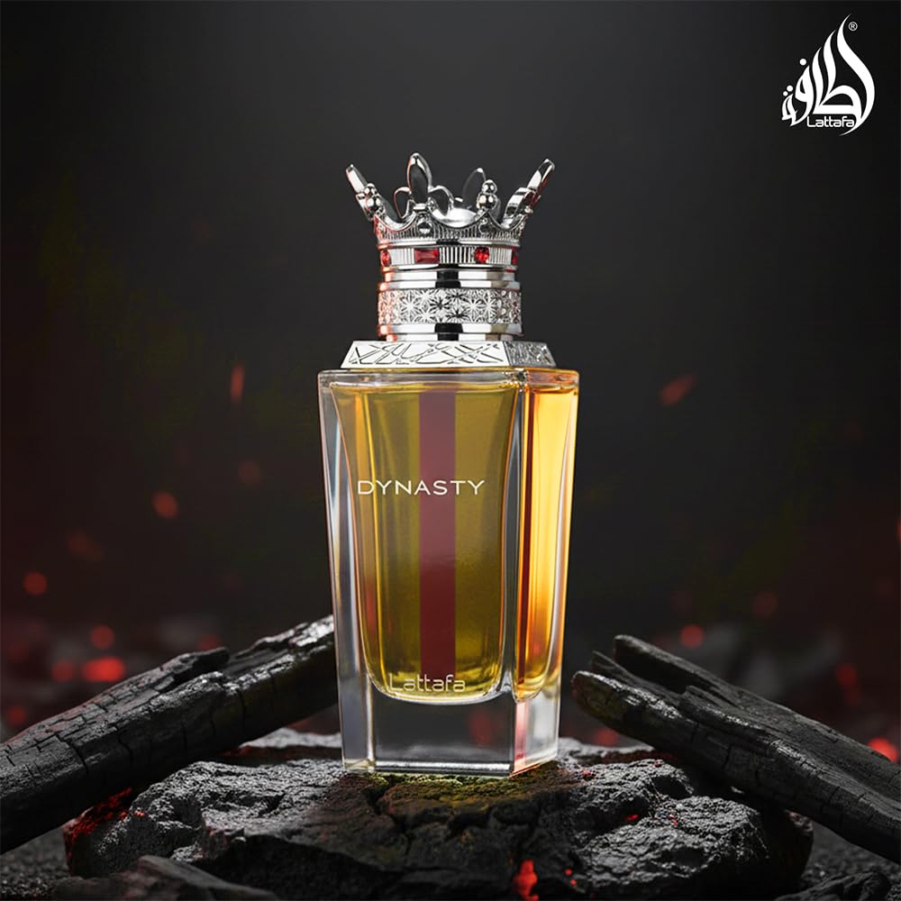 Lattafa Dynasty bottle on wooden table illustrating warm woody vibe