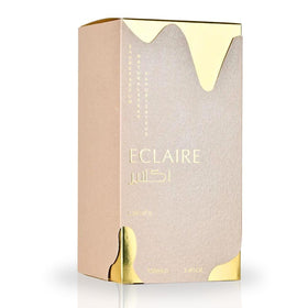 Lattafa Eclaire being sprayed on wrist, quick application and fragrant boost benefit