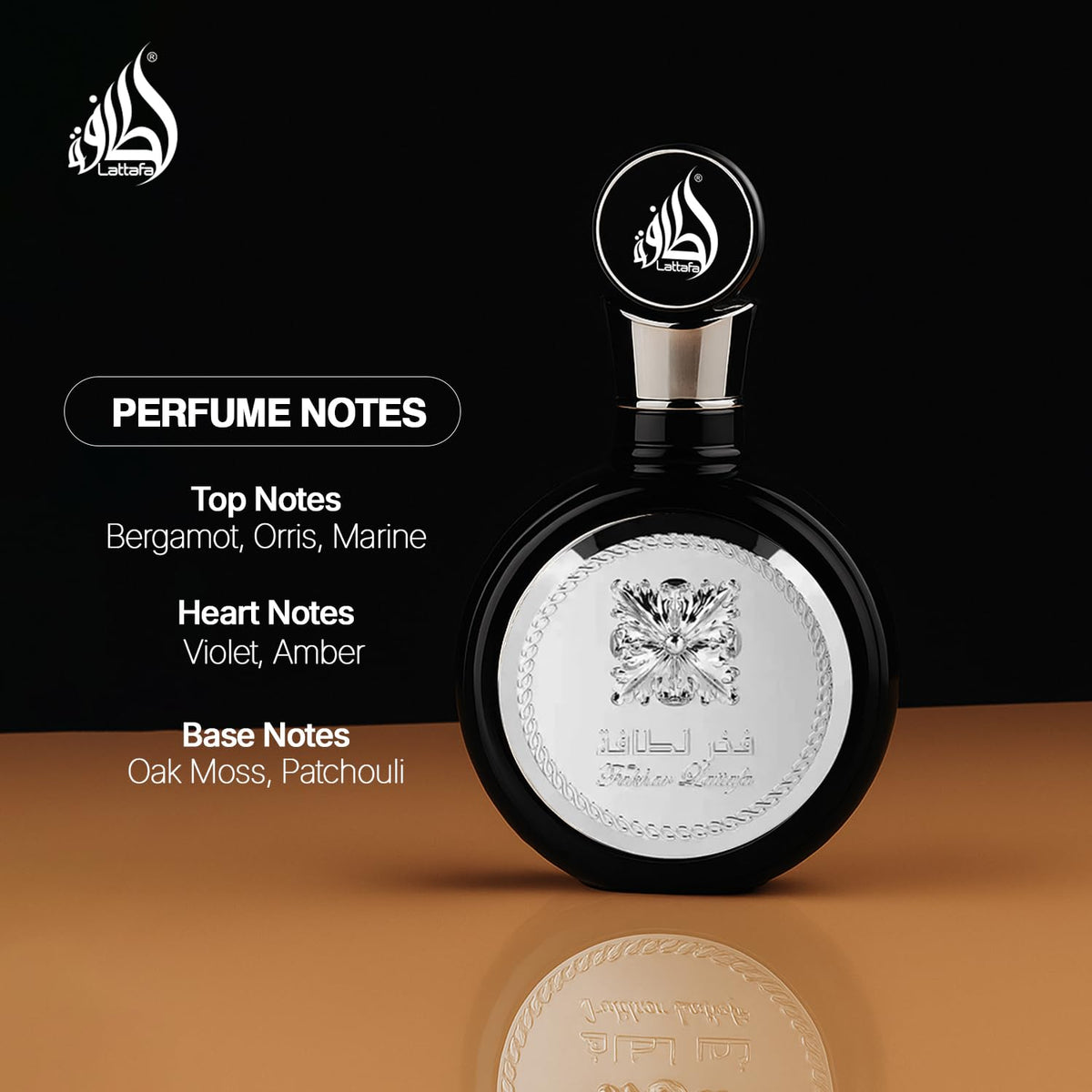 Lattafa Fakhar bottle in hand for scale showing 100 ml size