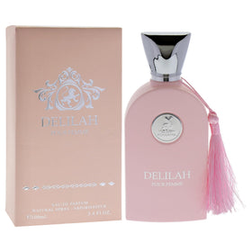 Lattafa Delilah spritz in motion demonstrating fine mist for balanced application