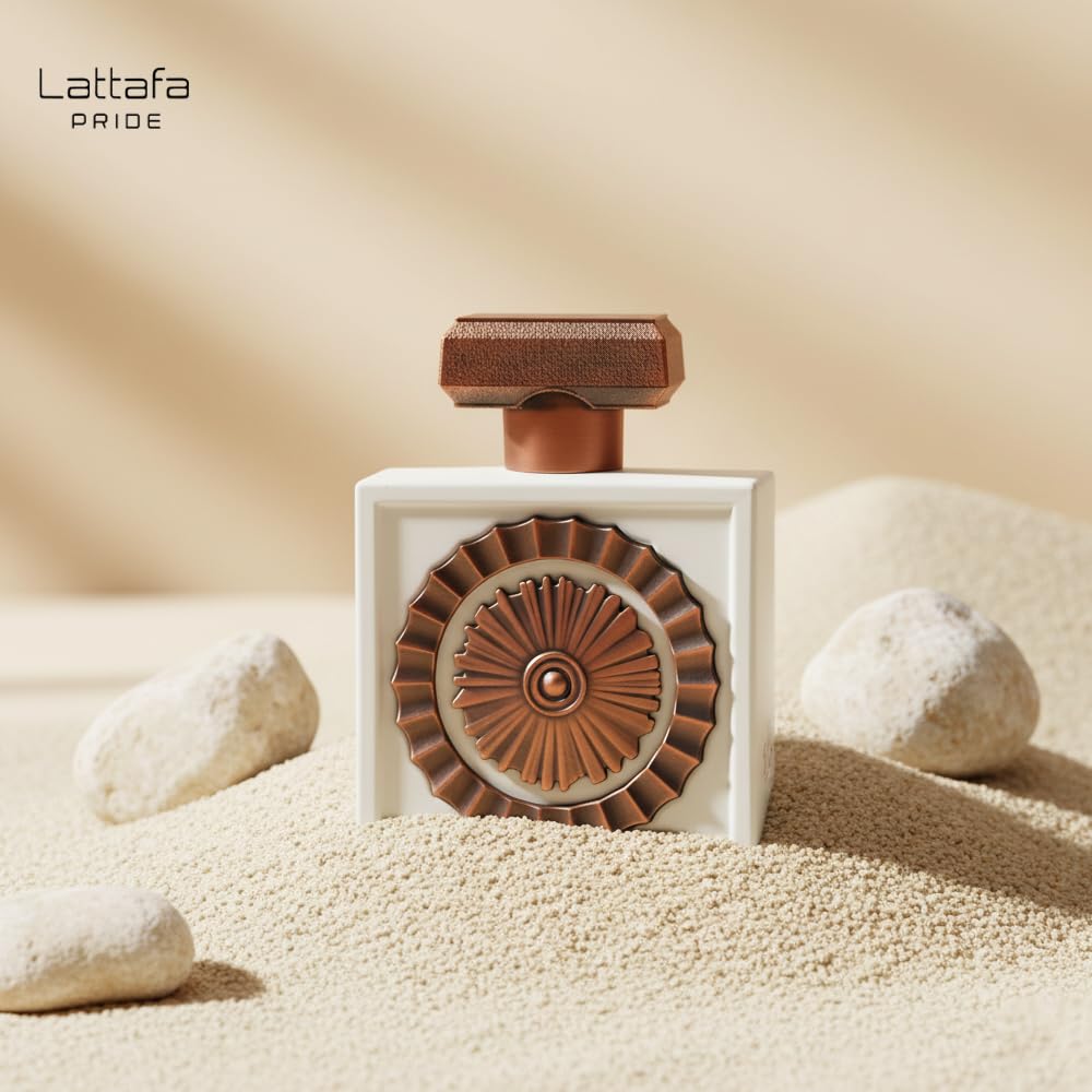 Lattafa Pride Nebras Elixir perfume texture pour illustrating creamy consistency and gourmand appeal