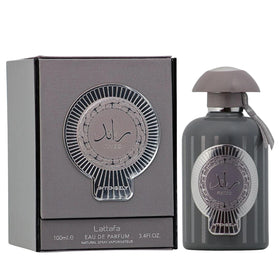 Lattafa product box and cap highlighting modern packaging and gift-ready design