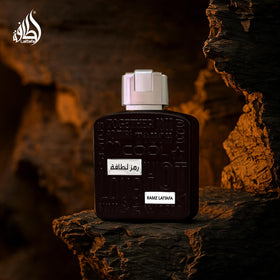 Lattafa Ramz Silver next to ruler showing 100ml size and scale
