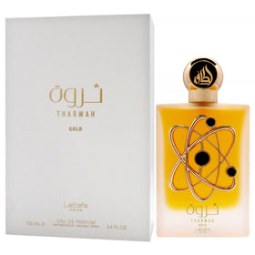 Lattafa Tharwah Gold label closeup featuring listed notes and refined unisex branding