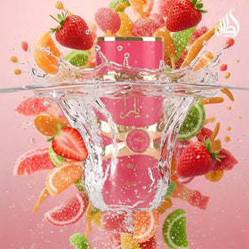 Lattafa Yara Candy 100ml held next to a common object showing true size benefit