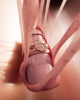 Lattafa Yara Elixir on a dressing table in evening setting conveying sweet sophistication