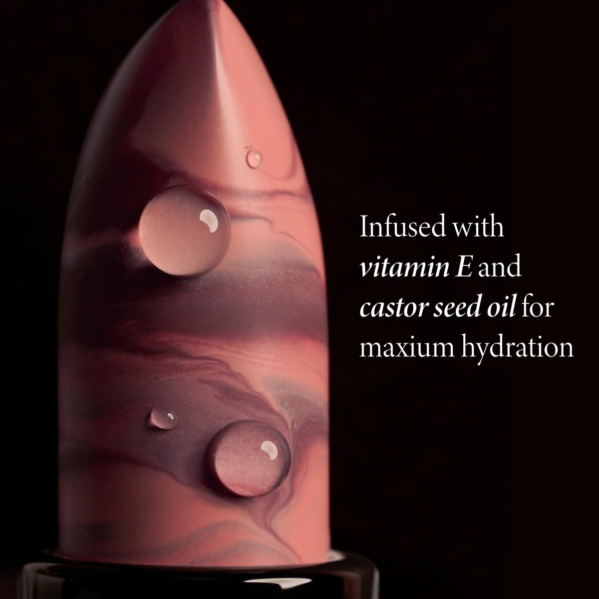 LAURA GELLER lipstick applied on lips delivering a hydrated cream finish and natural peach-rose tint