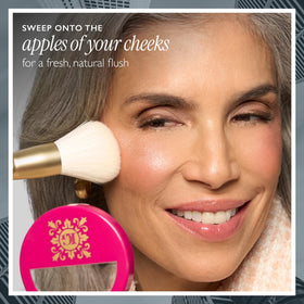 LAURA GELLER blush applied with fluffy brush for seamless blend benefit
