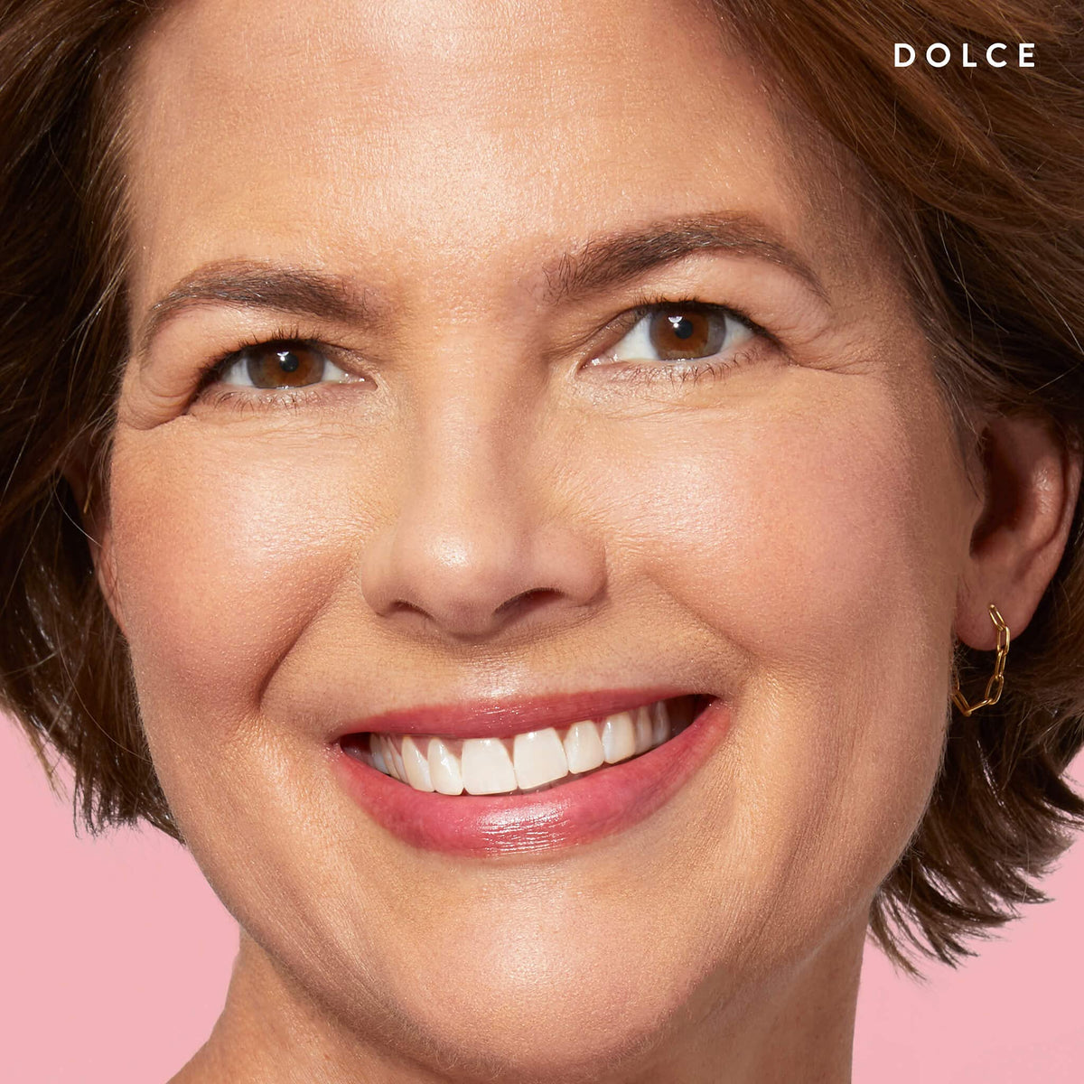 LAURA GELLER NEW YORK lipstick applied from tube demonstrating smooth glide