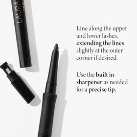 LAURA GELLER pencil held in hand to show compact size and travel convenience