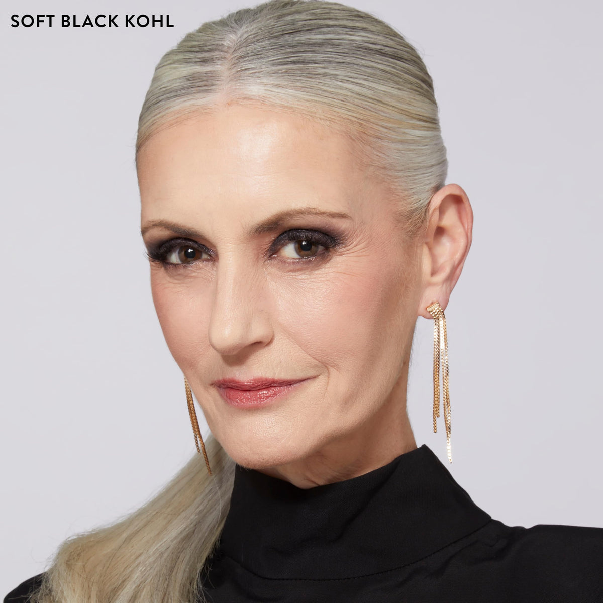 LAURA GELLER NEW YORK pencil applied to lashline, smooth smudgeable definition
