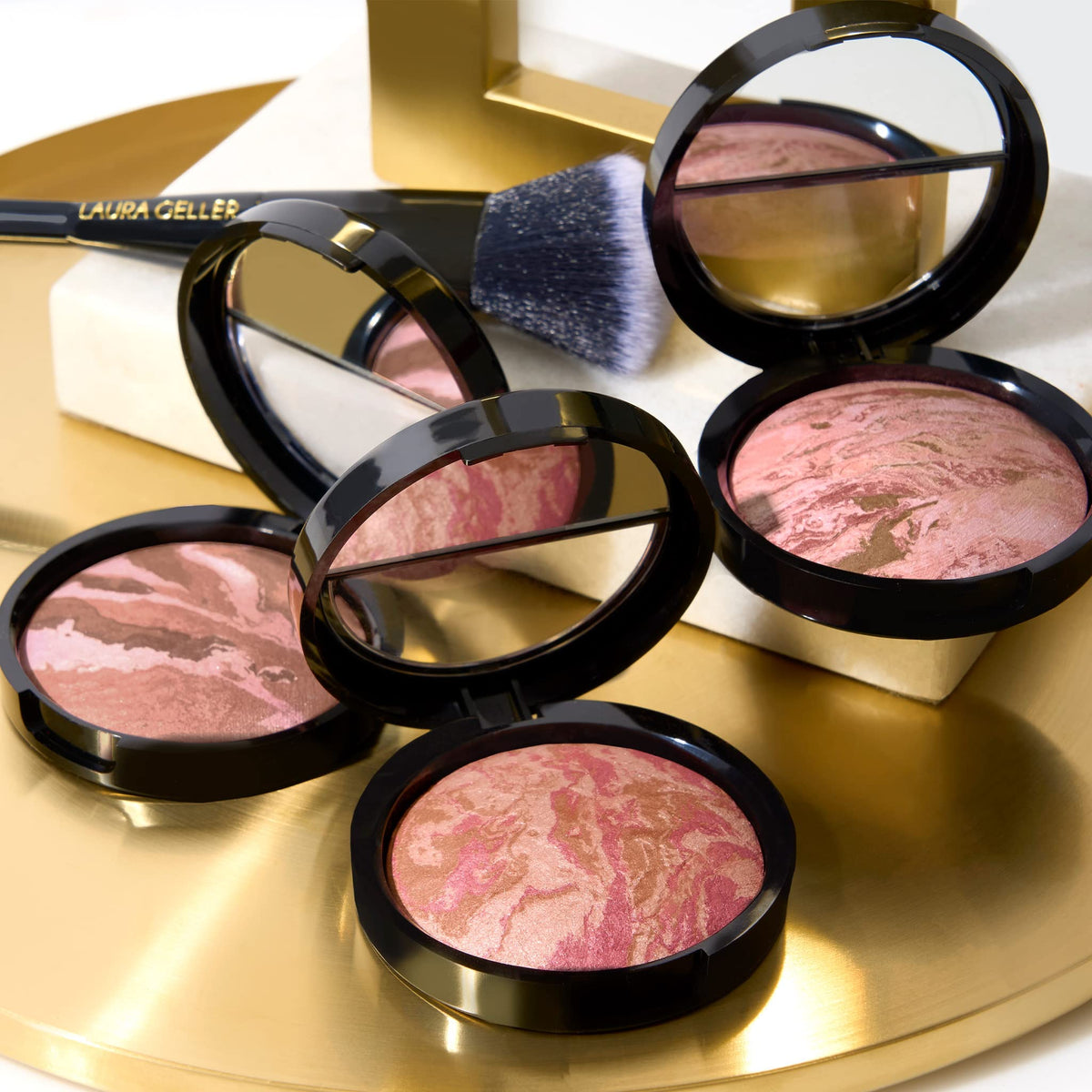 LAURA GELLER NEW YORK model applying Rose Bronze in daylight showing lifted cheek definition