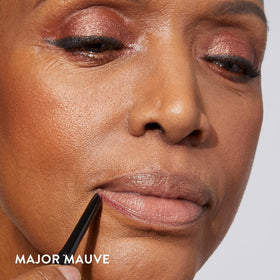 LAURA GELLER NEW YORK applied on lips displaying defined edges and long-wear benefit