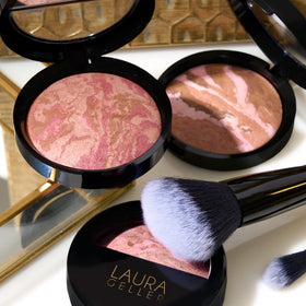 LAURA GELLER NEW YORK compact inside makeup bag ready for travel and quick touch-ups