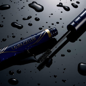 LAURA GELLER NEW YORK mascara applied to lashes closeup showing lengthened lifted effect