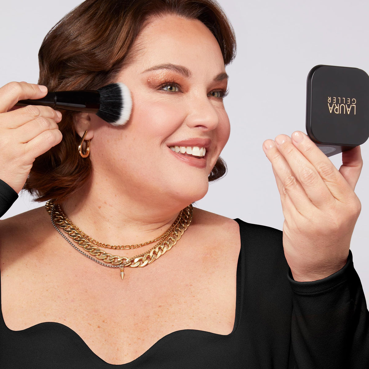 LAURA GELLER NEW YORK swatch on skin showing matte, blur effect instantly